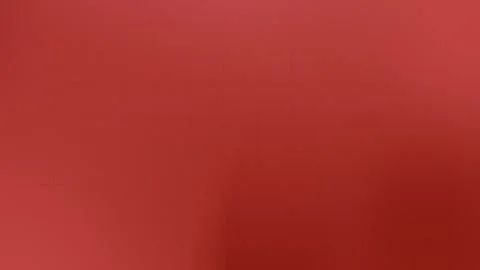 Red textured gradient with subtle grid pattern, perfect seamless loop background Stock Footage 309058994