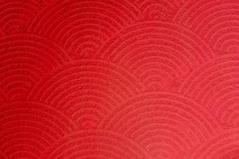 Red textured surface with repeating semi-circular wave patterns, resembling.. Stock Photos