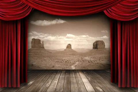Red theater curtain drapes with desert mountain background Stock Photos