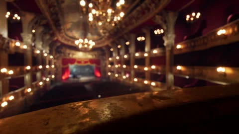 Red theater with golden elements in dark light Stock Footage 250469510