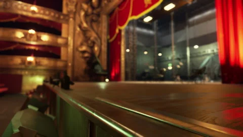 Red theater with golden elements in dark light Stock Footage 250767431