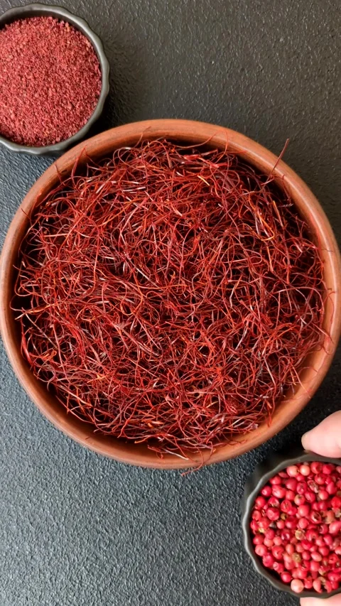 Red thin hot chili threads on a dark bac... | Stock Video | Pond5