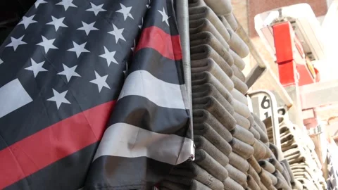 Red thin line black american flag on firefighter 911 truck. Firetruck and fire 스톡 동영상 341845634