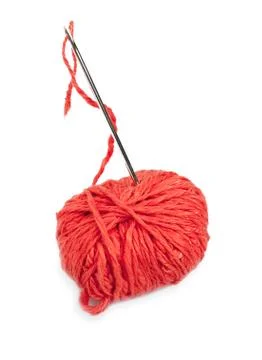 Red thread ball and needle with pink thread Foto stock