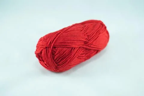 Red thread ball on white background Stock Photos