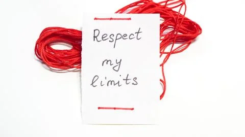 Red thread with note saying "Respect my limits" on white background Stock Photos