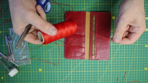 Red thread stitching leather red wallet DIY craft 스톡 동영상 148048018