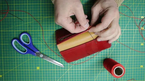 Red thread stitching leather red wallet DIY craft 스톡 동영상 148048057
