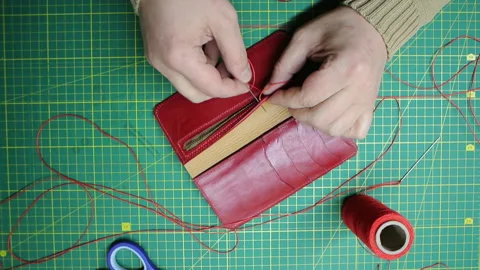 Red thread stitching leather red wallet DIY craft 스톡 동영상 148048064
