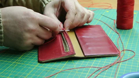 Red thread stitching leather red wallet DIY craft 스톡 동영상 148048079