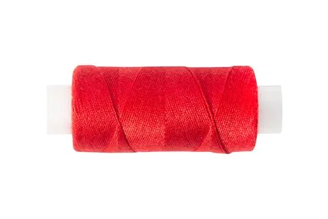 Red threads for sewing. Isolated on a white background. Stock Photos