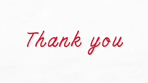Red threads stretch across a white paper to form the words “Thank you” Stock Footage 341497121