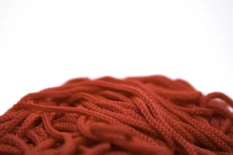 Red threads on white background close-up Foto stock