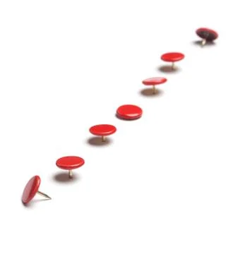 Red thumb tacks Stock Photos