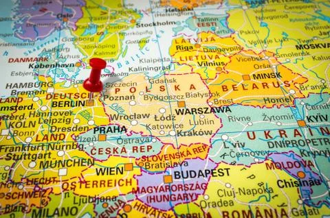 Red thumbtack in a map, pushpin pointing at Berlin city Stock Photos