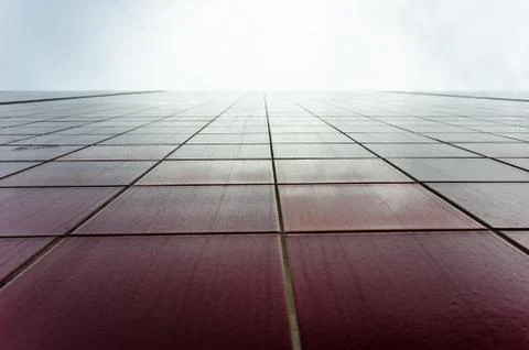 Red tile wall from below Stock Photos