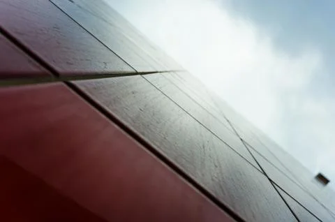 Red tile wall from below Stock Photos