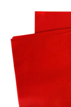 Red tissue wrapping sheets for flowers stacked neatly isolated on white bac.. Stock Photos