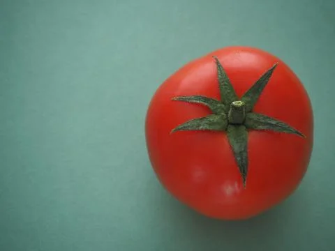 Red tomato close-up. Stock Photos
