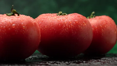 Red tomato in the kitchen while cooking. Light smoke hovers in the background. Stock Footage 154888654