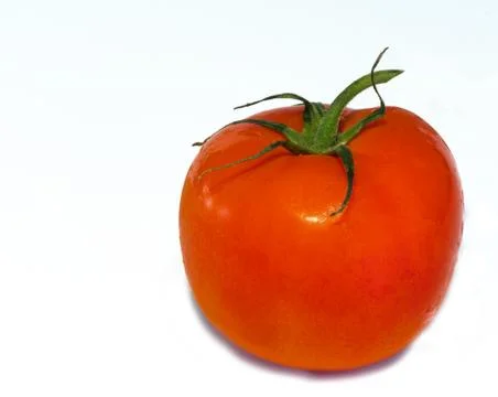 Red tomato lies on the table, vegetable Stock Photos