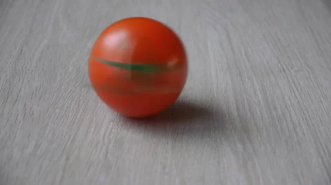 Red Tomato Spinning On A Table Stock Footage 64859711