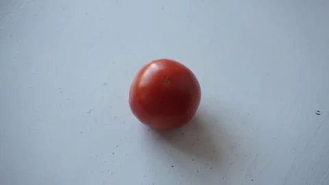 Red tomato on the surface Stock Photos