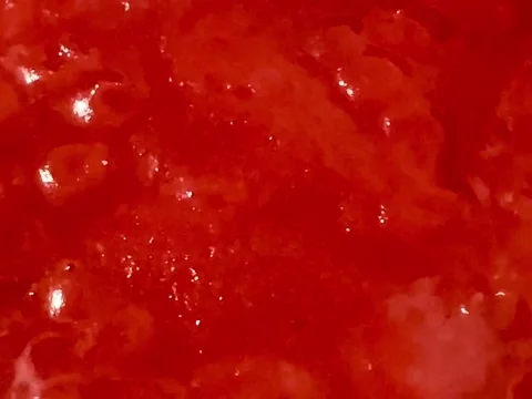 Red tomato sweat boiling in a pot Stock-Footage 221857492