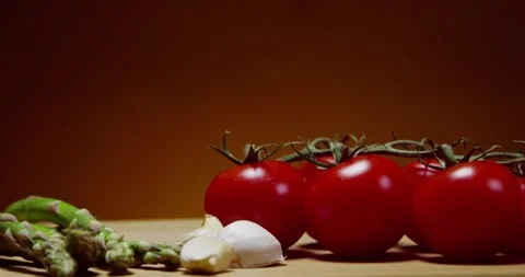 Red Tomatoes And Fresh Vegetables On Table Stock Footage 243429722