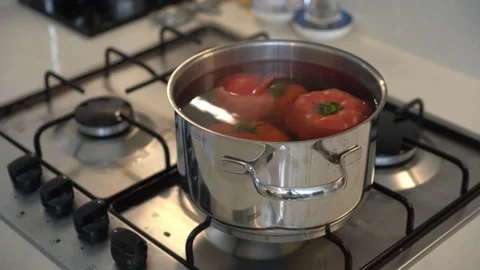 Red Tomatoes Boiling And Stir With A Spoon In A Metal Pan. Stock Footage 162599645