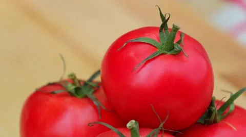 Red tomatoes on the culinary board close-up Stock Footage 52903690