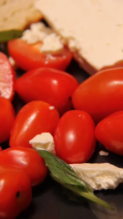 Red tomatoes detail close up panning vertical Video stock 321760141