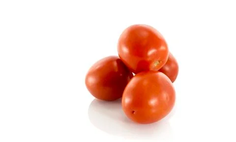 Red tomatoes isolated on white Stock Photos