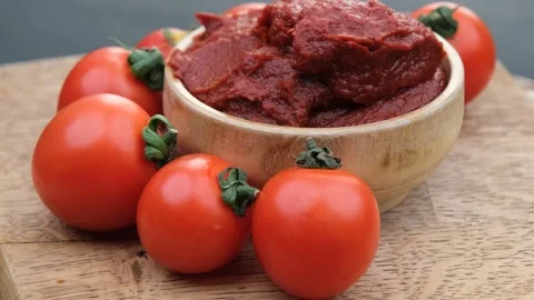 Red tomatoes paste Stock Footage 260162601