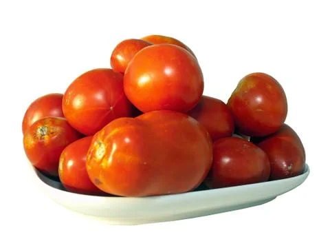 Red tomatoes on plate Stockfoto's