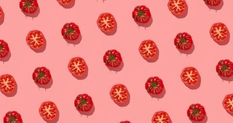 Red tomatoes seamless pattern on pastel pink background Stock Photos