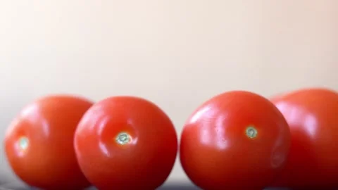 Red tomatoes spinning close up Stock Footage 156529931