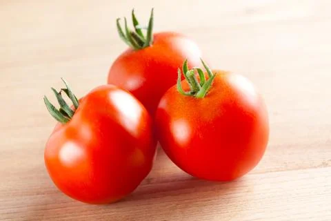 Red tomatoes on table Stock Photos