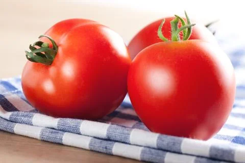 Red tomatoes on table Stock Photos