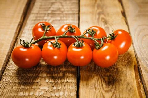 Red tomatoes on the table Stock Photos