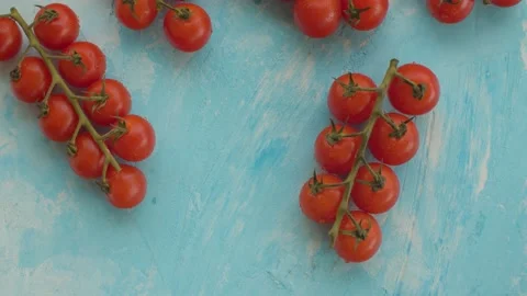 Red tomatoes with water drops on a branches Stock Footage 136943038