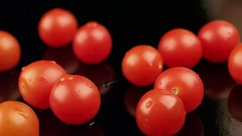 Red tomatoes with water drops Stock Footage 74701672