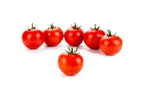 Red tomatoes on a white background Stock Photos