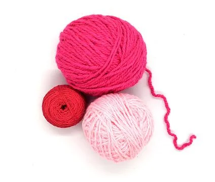 Red tones of balls of thread. red tone balls of yarn on white background top  Fotos Stock