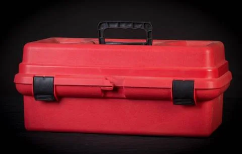 Red tool box on black background Stock Photos