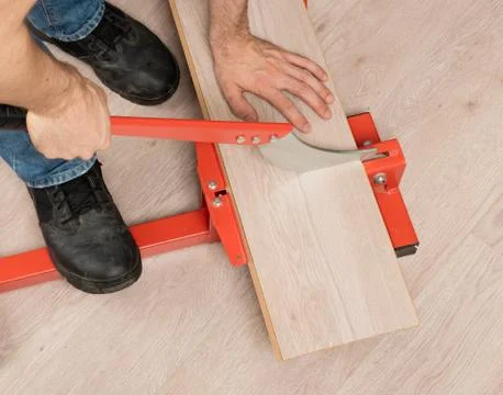 Red tool for cutting laminate Stock Photos