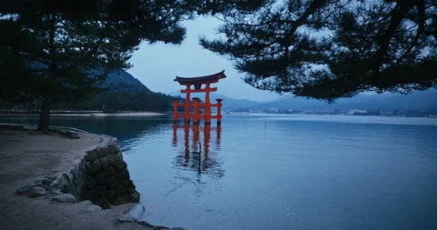 Red Torii Gate Standing in Water at Dusk Miyajima Japan Stock Footage 344700481