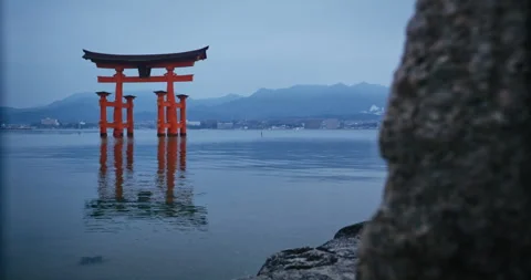 Red Torii Gate Standing in Water at Dusk Miyajima Japan Stock Footage 344700502