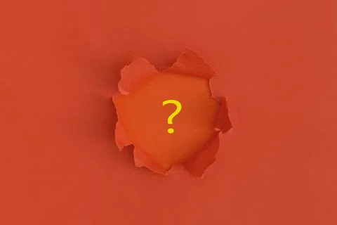 Red torn paper with space for text with red background. Question mark. Stock Photos