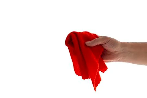 Red towel in the hand. Stock Photos
